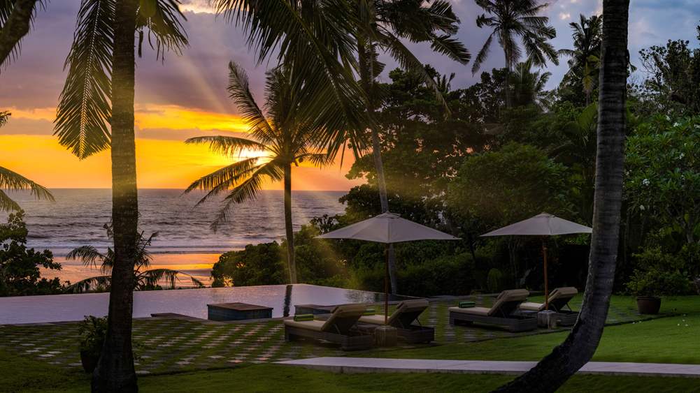 Villa Kailasha - dramatic sunset from pool